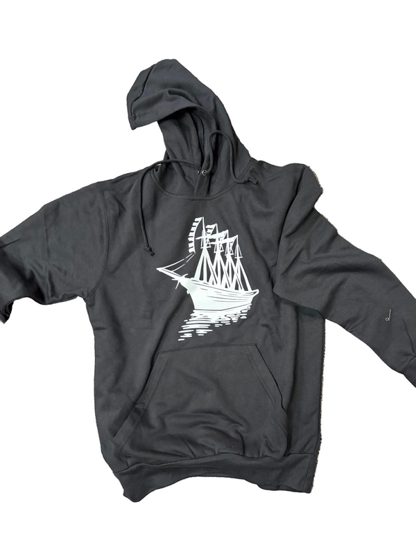 A black pullover hoodie with a white graphic of a tall ship on the chest